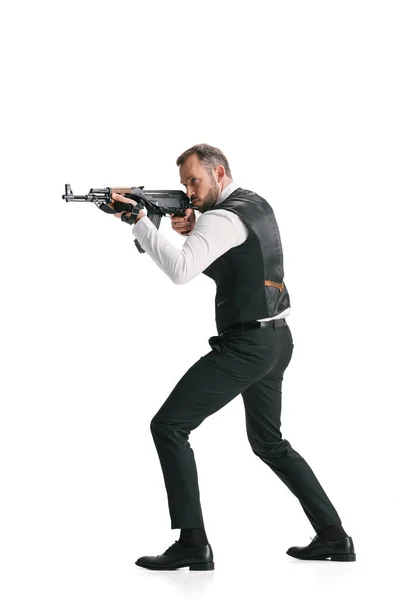 Secret agent in suit with rifle — Stock Photo