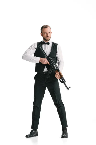 Secret agent in suit with rifle — Stock Photo