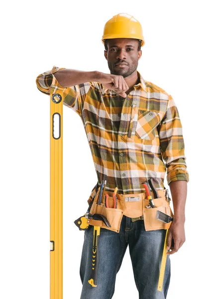 Construction worker with leveling tool — Stock Photo