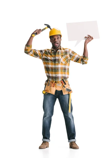 Builder holding blank speech bubble — Stock Photo