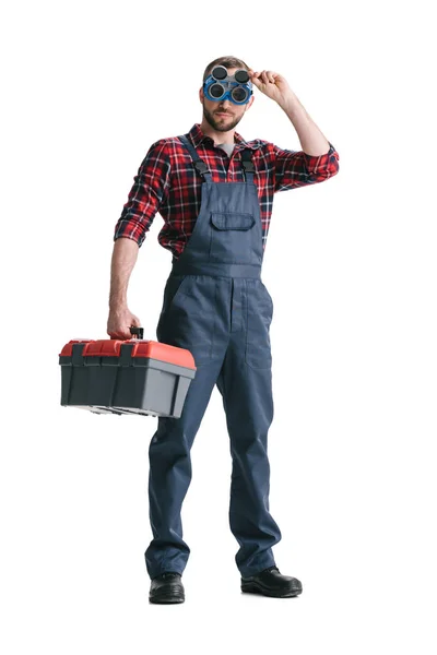 Trabajador de la construcción con caja de herramientas - foto de stock