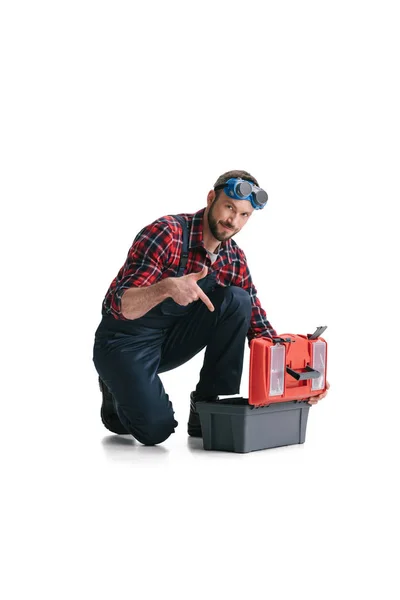 Trabajador de la construcción con caja de herramientas - foto de stock