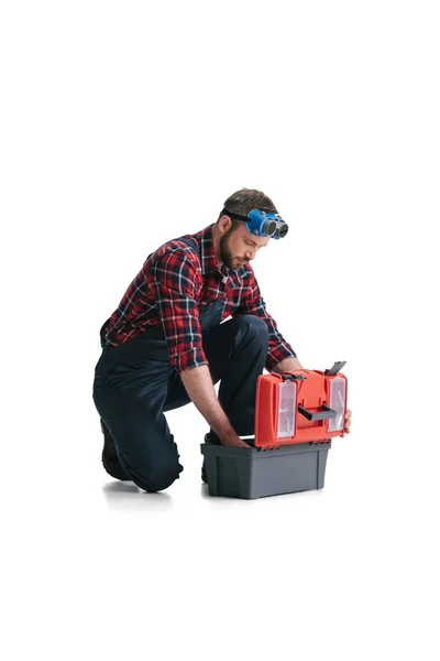 Trabajador de la construcción con caja de herramientas - foto de stock