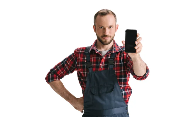 Hombre guapo con smartphone - foto de stock