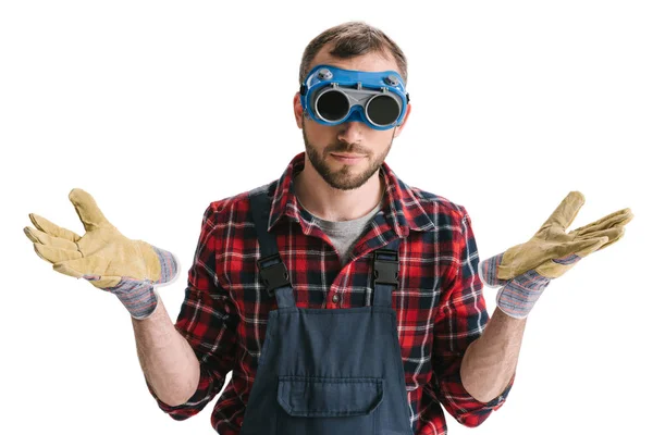 Trabajador en gafas de soldadura y guantes - foto de stock