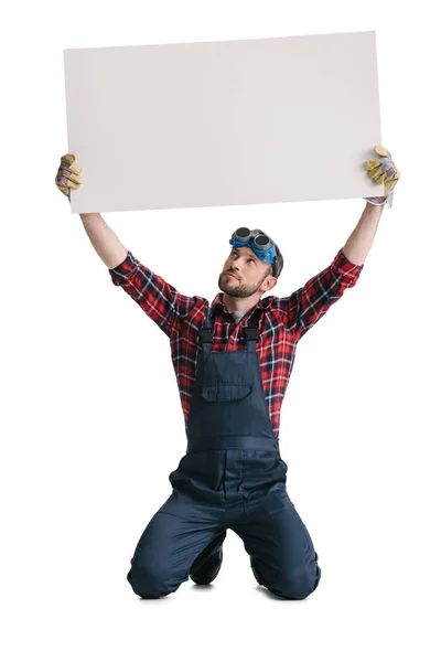 Construction worker with blank banner — Stock Photo