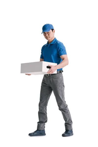 Young asian courier with blank box — Stock Photo