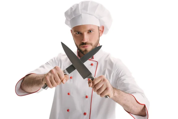 Jeune chef aiguiseur couteaux — Photo de stock