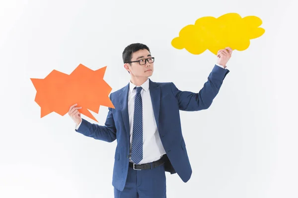 Asiático hombre de negocios con tarjetas en blanco - foto de stock