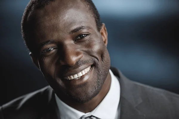 Smiling african american businessman — Stock Photo