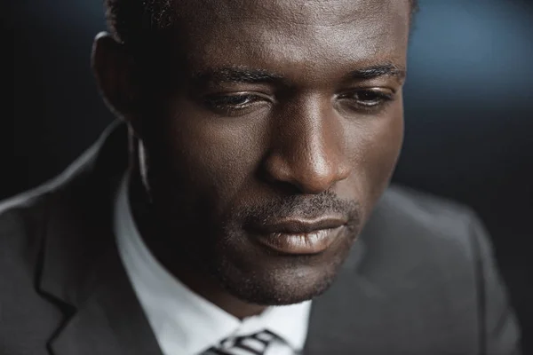 Pensive african american businessman — Stock Photo