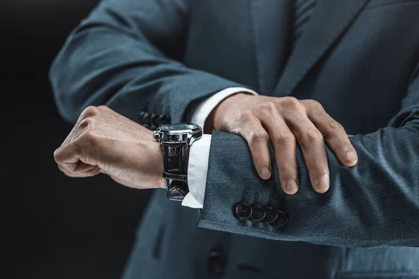 Businessman checking time — Stock Photo