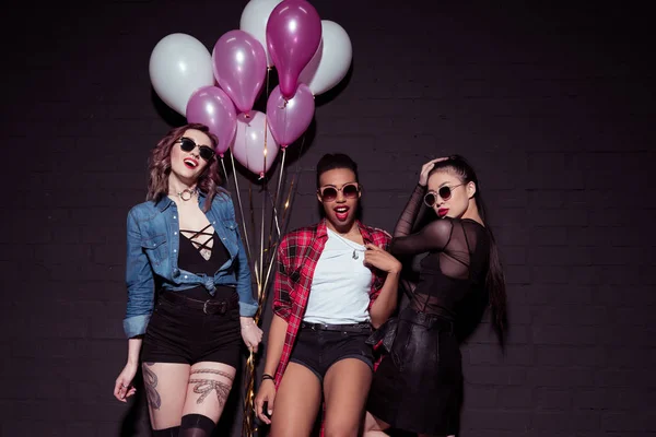 Multicultural women with balloons — Stock Photo