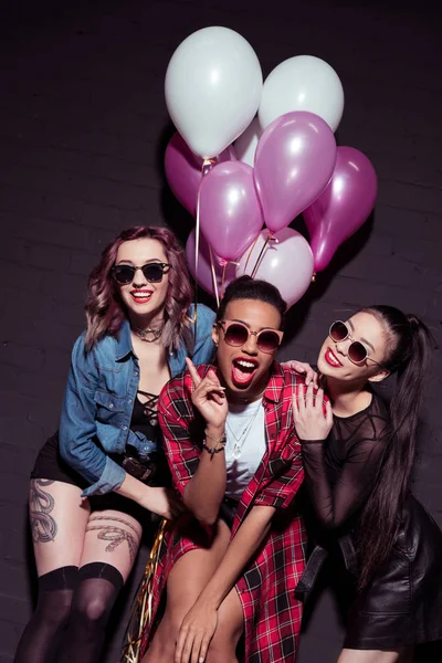 Multicultural women with balloons — Stock Photo