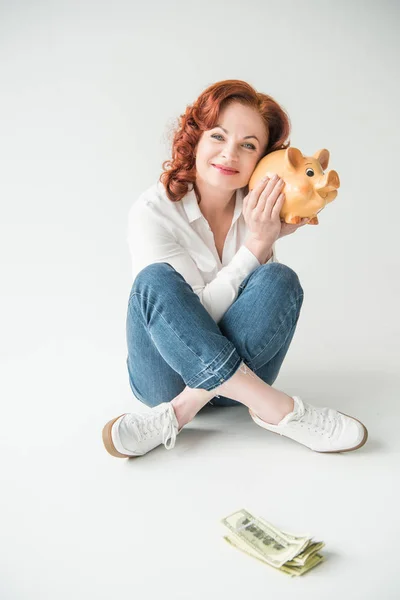 Жінка з доларами і скарбничкою — Stock Photo