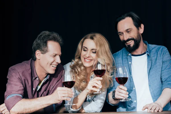 Friends drinking wine — Stock Photo