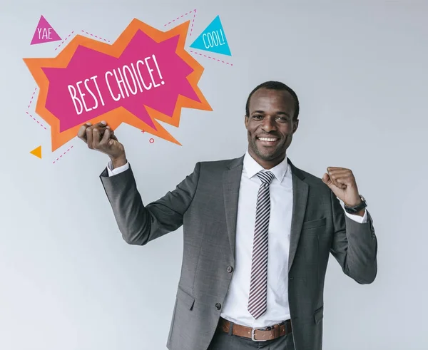 Hombre de negocios afroamericano con tarjeta de la mejor opción - foto de stock