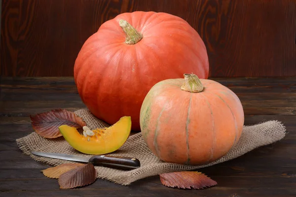 Pumpkin with leaves on canvas — Stock Photo, Image