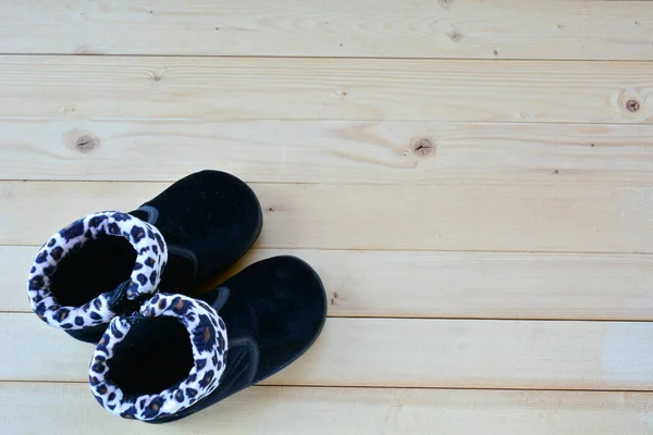 Shoes of baby or child on wood table top view under nature light — Stock Photo, Image