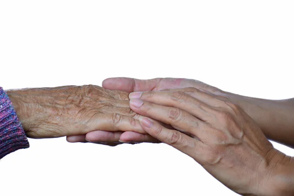 Рука старушки и молоденькой леди, держащей вместе Ом белый спину — стоковое фото