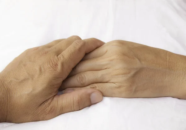 Hand massage in the salon on a white background closeup — Stock Photo, Image