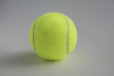 Tek sarı tenis topu arka planı kapat