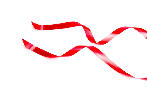 A fita vermelha espiral isolada no fundo branco . — Fotografia de Stock