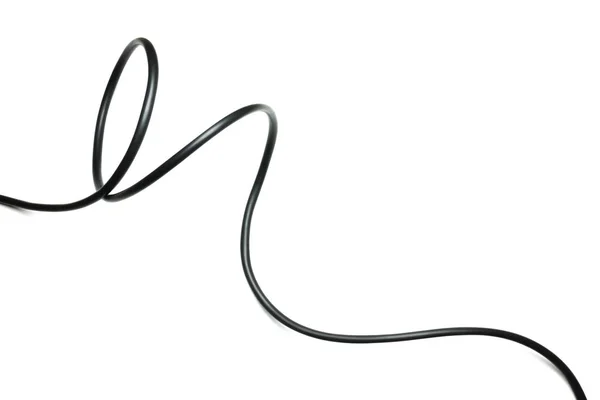 Černý vodič kabel izolované na bílém pozadí abstrakce. — Stock fotografie