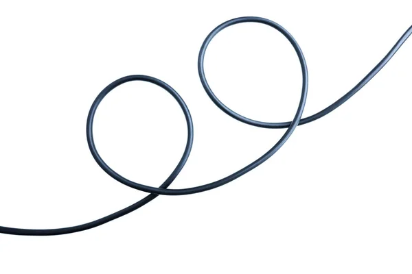 Cable de alambre negro aislado en una abstracción de fondo blanco. — Foto de Stock