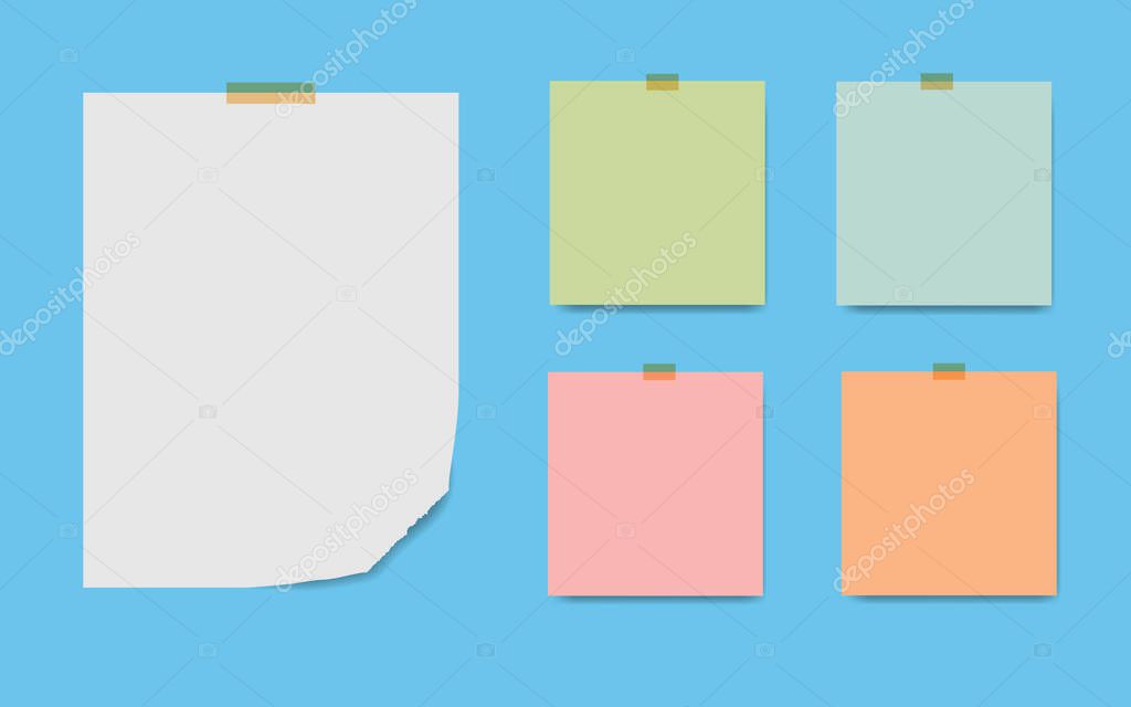 Blank squared notepad pages and tape. Note paper stuck with beige sticky tape.