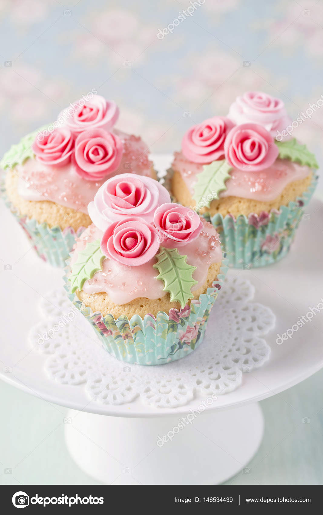 Pastel colored cupcakes Stock Photo by ©Elena Schweitzer 146534439