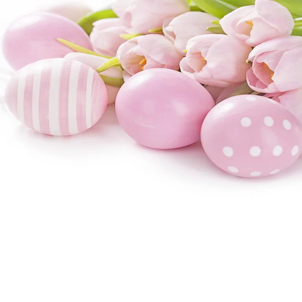 Pink easter eggs and tulips Stock Photo