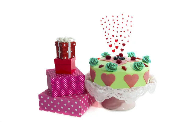 Sweet cake with presents — Stock Photo, Image