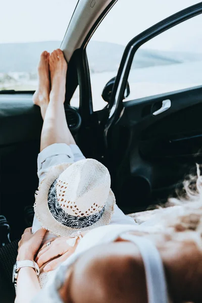 Girl having a rest in a car — Stock Photo, Image