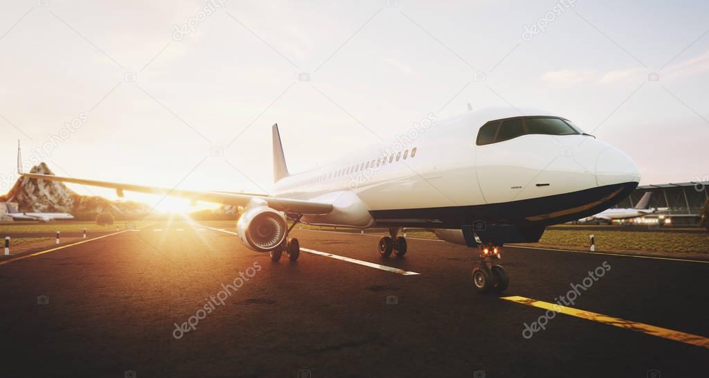 White commercial airplane standing on the airport runway at sunset. Front view of passenger airplane is taking off. Airplane concept 3D illustration.