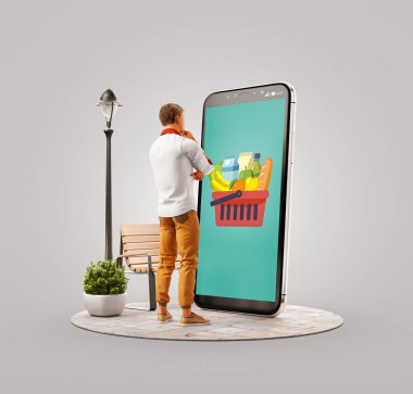 Büyük akıllı telefonun başında duran ve market siparişi veren genç bir adamın alışılmadık üç boyutlu görüntüsü. Yemek teslimatı uygulamaları konsepti. İnternetten market alışverişi..