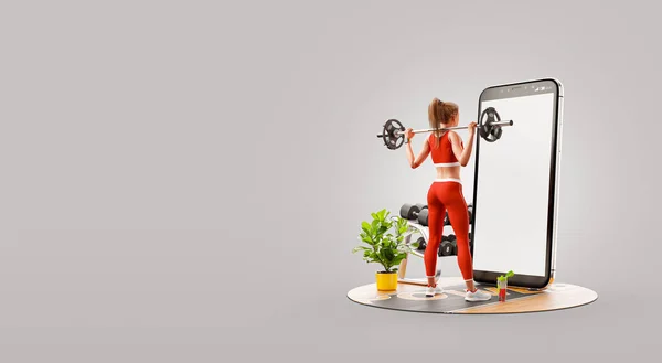 Spor Salonundaki Genç Kadın Akıllı Telefonun Önünde Halterle Çömeliyor Egzersiz — Stok fotoğraf