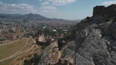 Drone view Sudak Genoese Fortress during sunny day. Crimean landmark