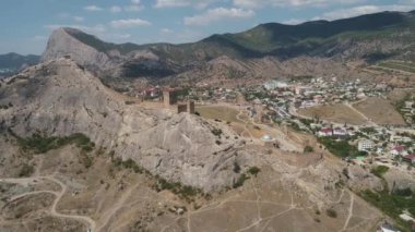Drone view Sudak Genoese Fortress during sunny day. Crimean landmark