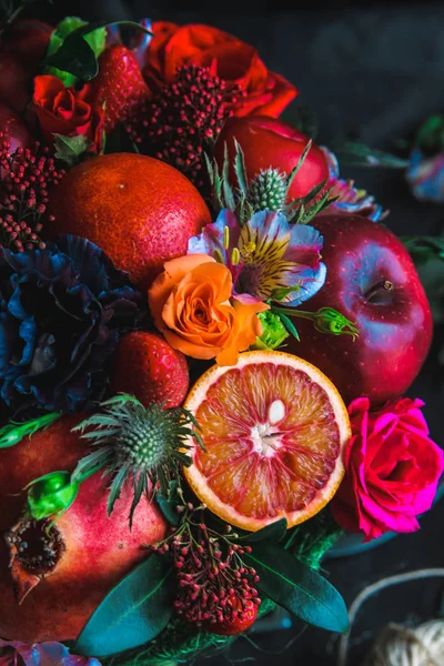 bouquet of flowers and fruits
