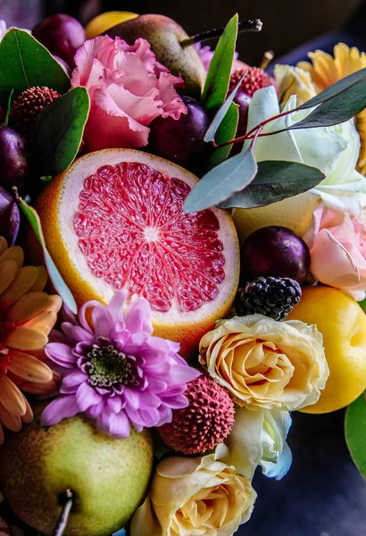bouquet of flowers and fruits