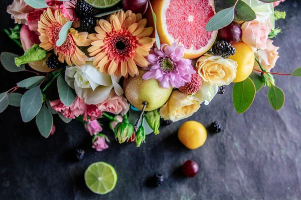 bouquet of flowers and fruits