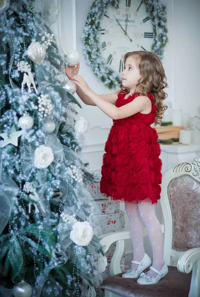 Girl near Christmas fir tree — Stock Photo, Image