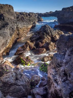 Çarpıcı cam beach, Kauai kayadan lav