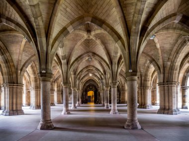 GLASGOW, SCOTLAND - JULY 20: Cloisters connecting the quadrangles of the ancient University of Glasgow on July 20, 2017 in Glasgow, Scotland. It is one of the four ancient Scottish universities. clipart