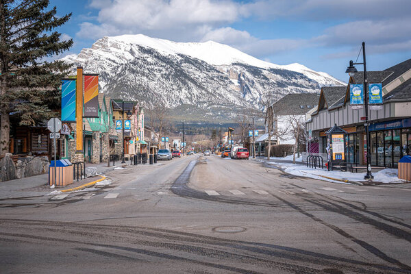 Canmore, Alberta - April 4, 2020: View of the main street in the mountain town of Canmore Alberta. Canmore is a popular tourist destination close to Banff National Park.