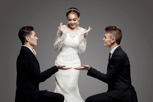 Two handsome men and beautiful bride, studio — Stock Photo, Image