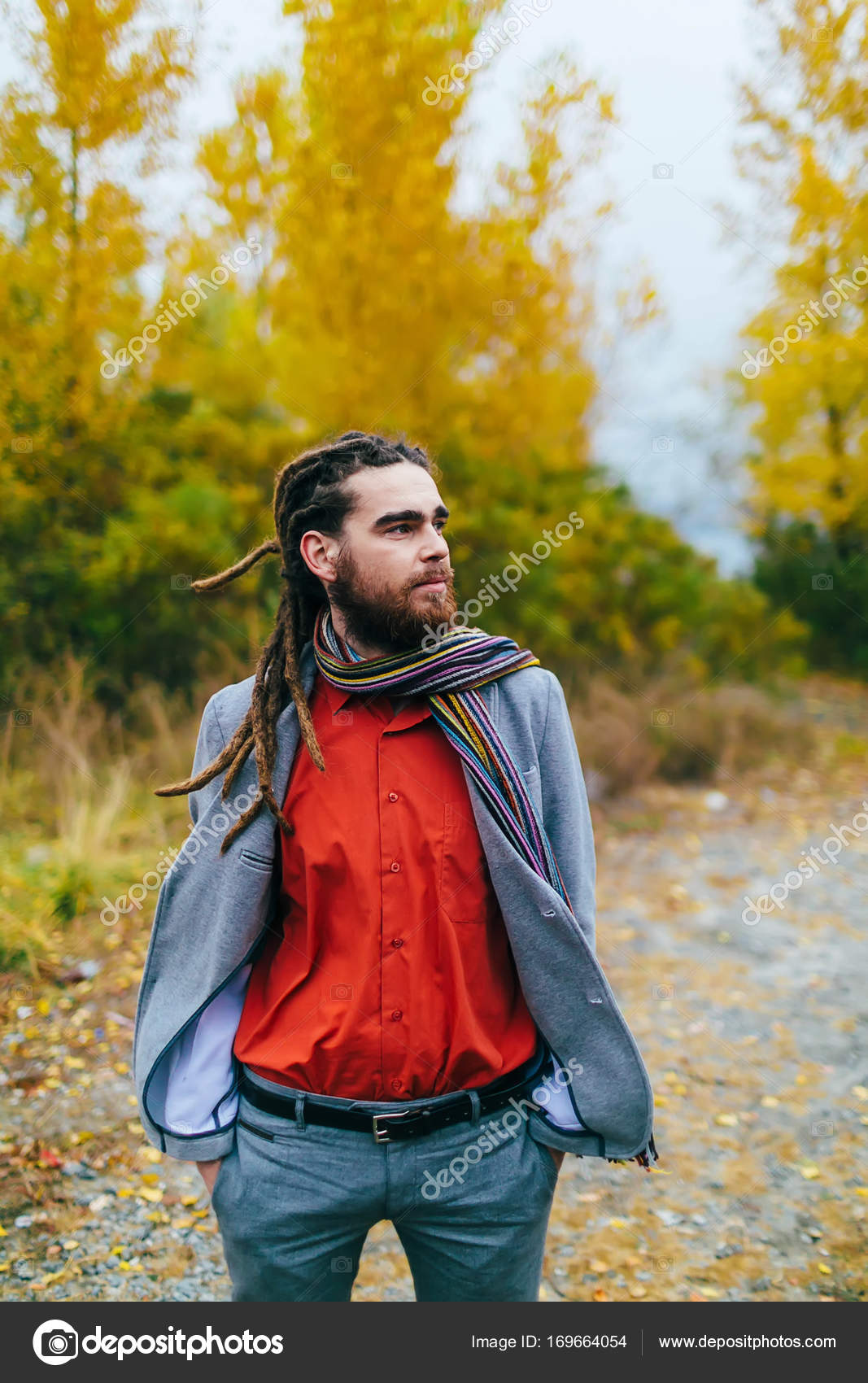 grey jacket red shirt