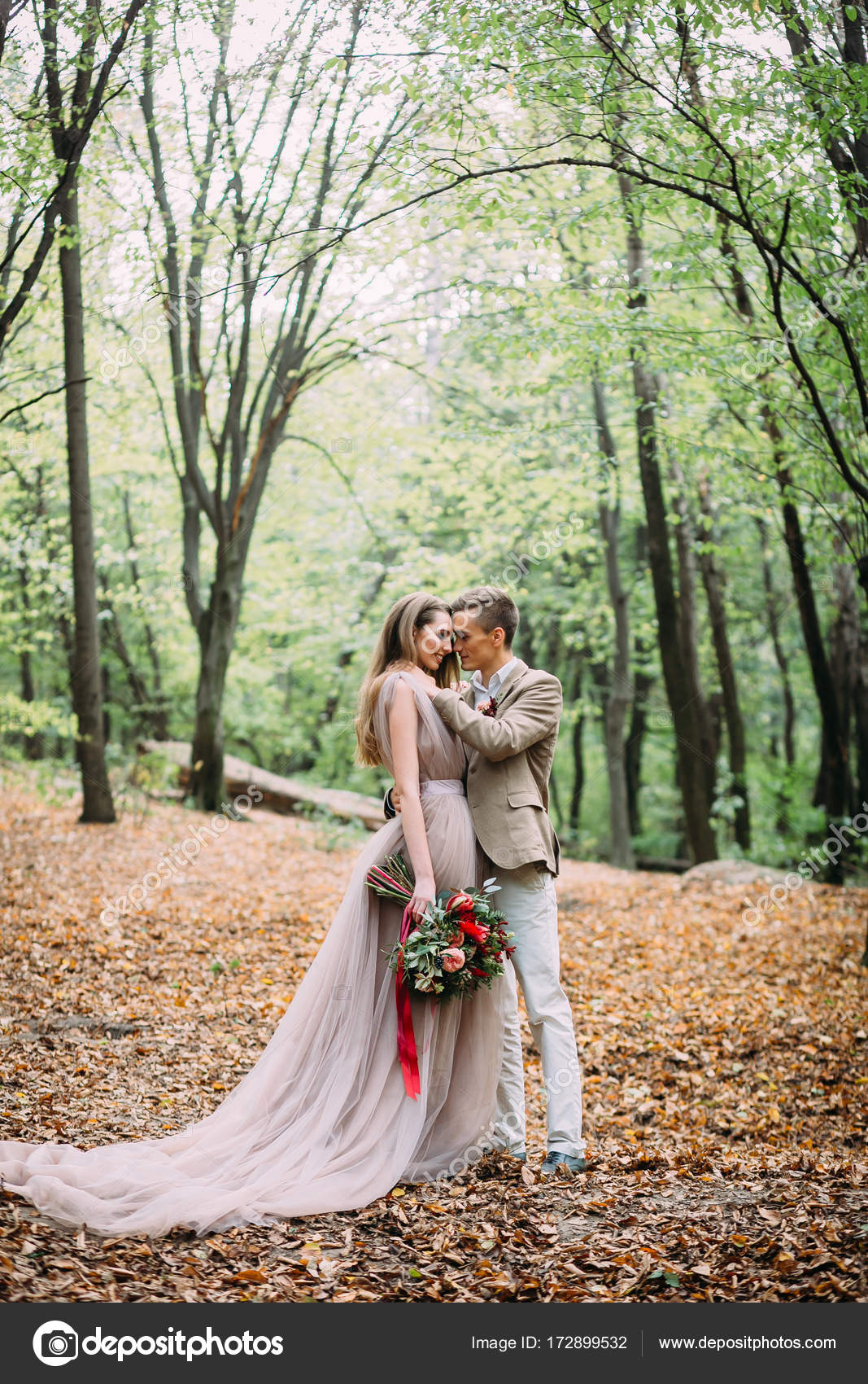 A Happy Couple Is Walking On A Trail In An Autumn Forest Bride And Groom Are Looking At Each Other On Nature Stock Photo Image By C Stahov A Happy Couple Is Walking On A Trail In An Autumn Forest Bride And Groom Are Looking At Each Other On Nature Stock Photo Image By C Stahov