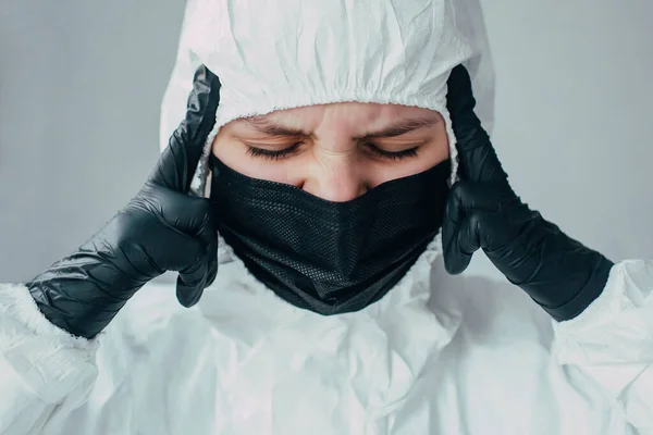 Virologist Protective Suit Medical Mask Holds His Head Black Gloves — Stock Photo, Image